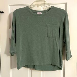 Light green top, stops at the waist with 3/4 sleeves, like new, small